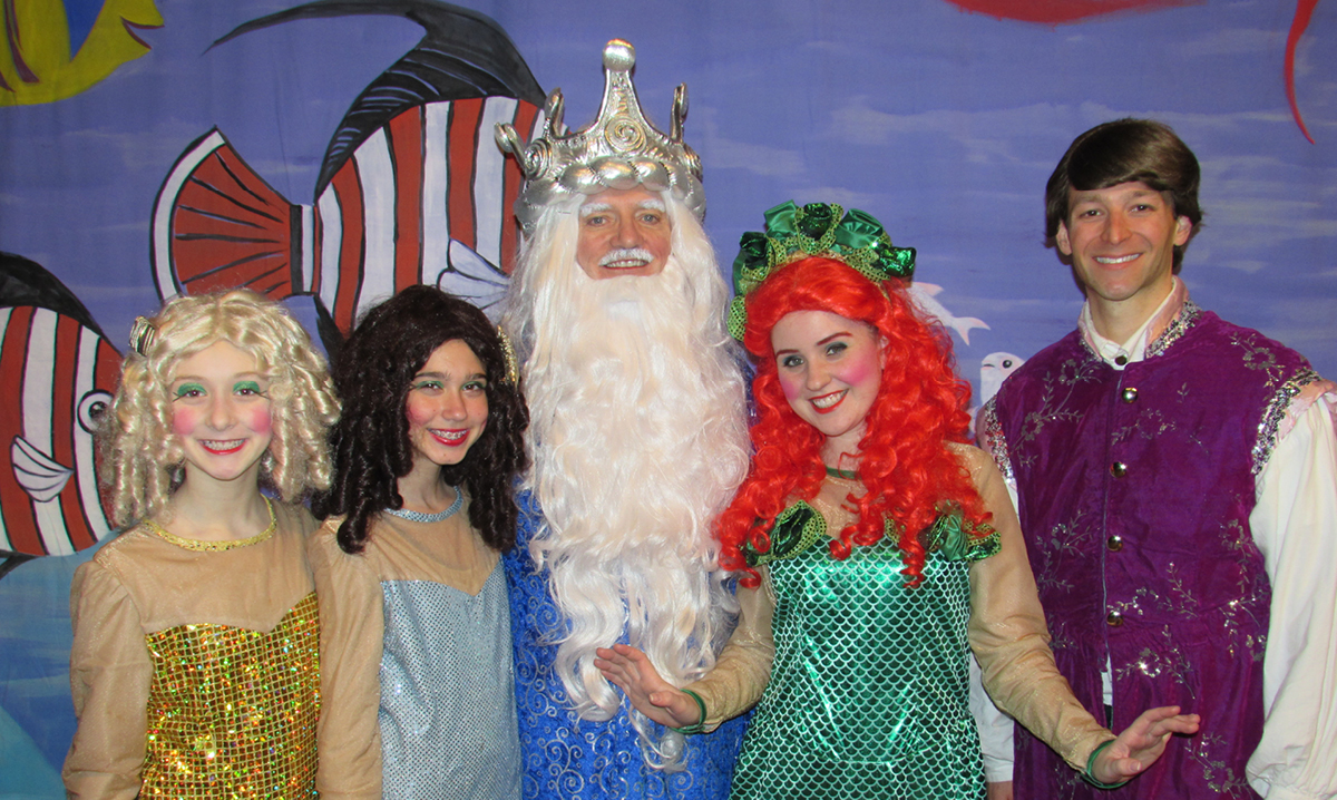 Cast of Little Mermaid at Marquis Theatre pose for a photo