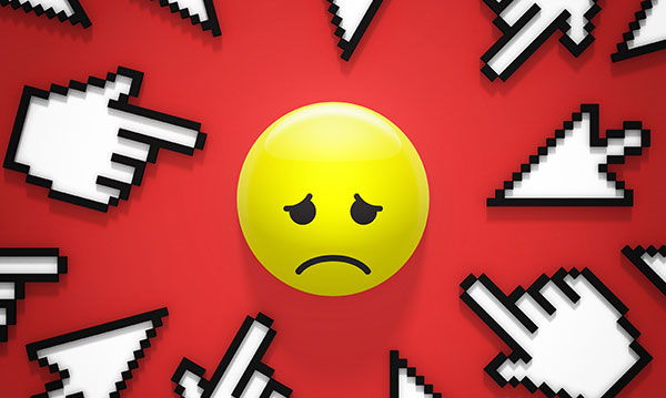 sad smiling face with arrows pointing at it