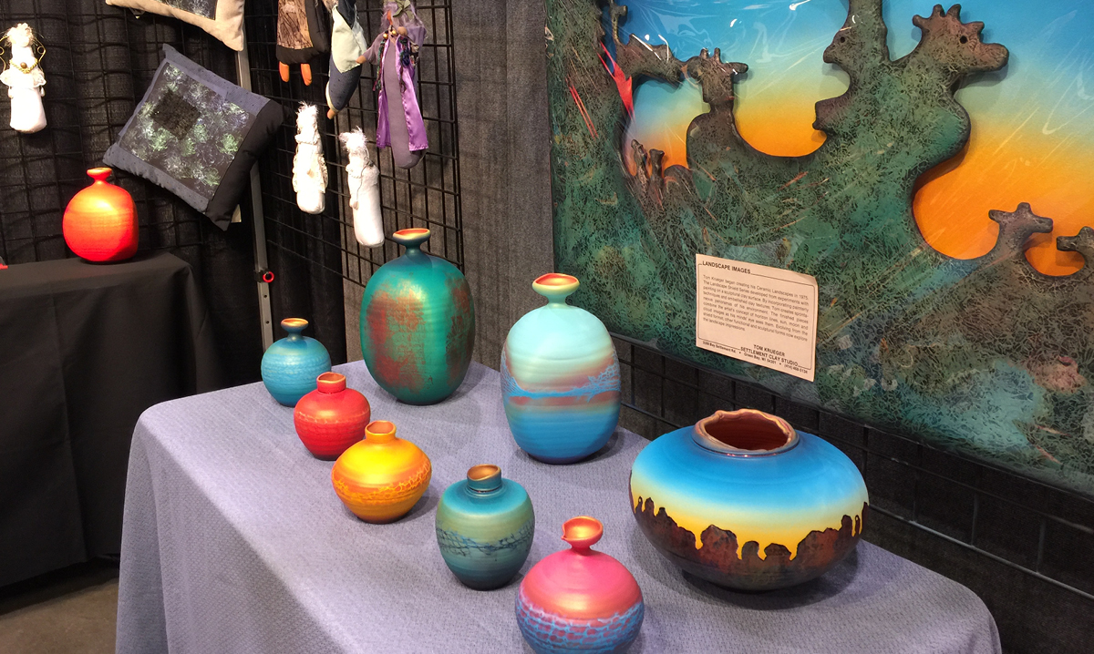 Colorful handmade pots on display