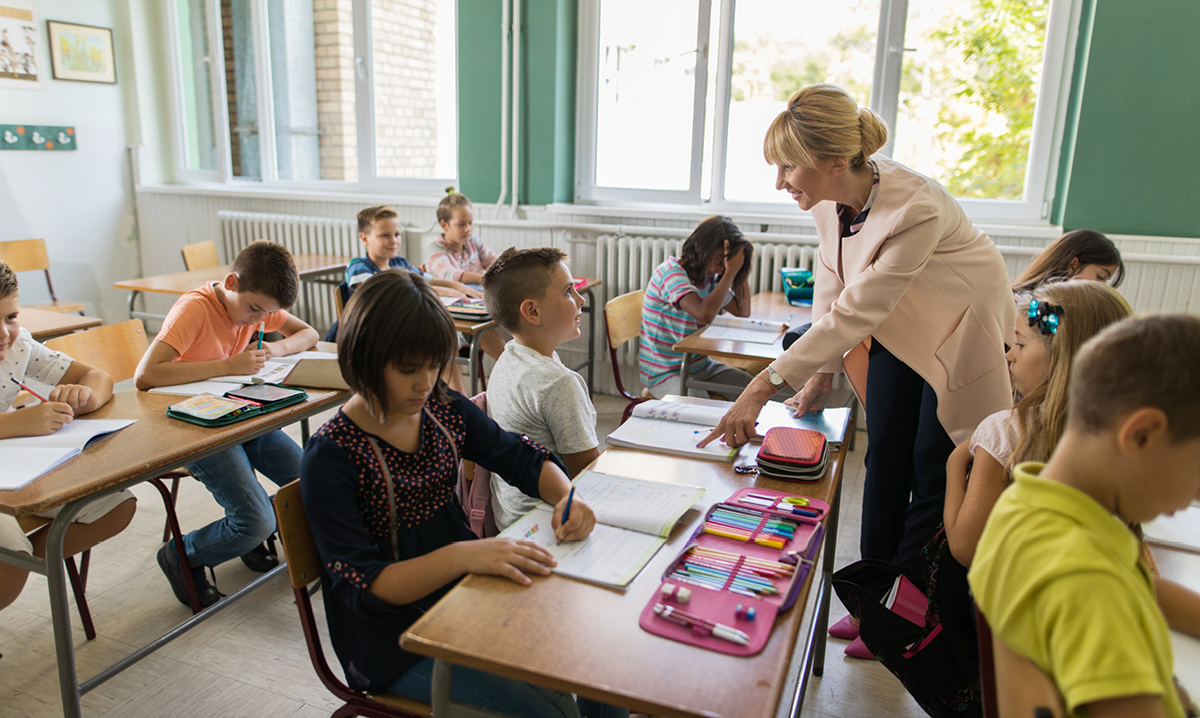 Teaching working with students in a classroom