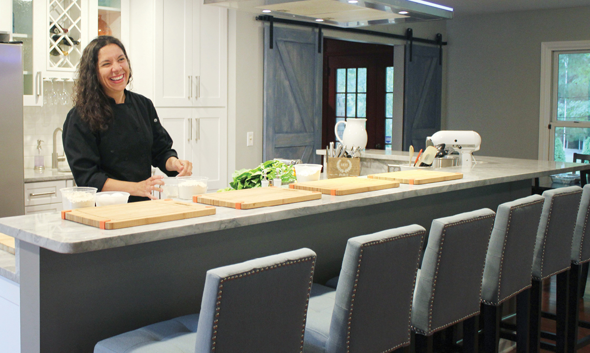 Jessica Sweetman in a kitchen for Experience Cooking