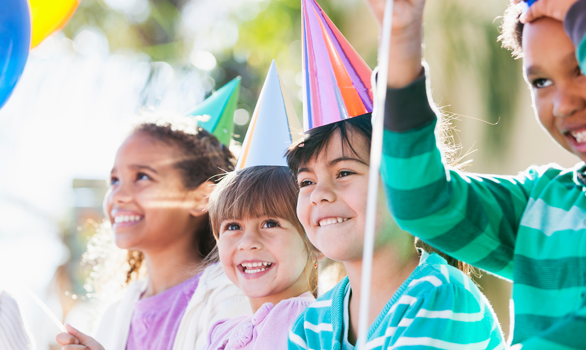 Kids celebrating a birthday outside