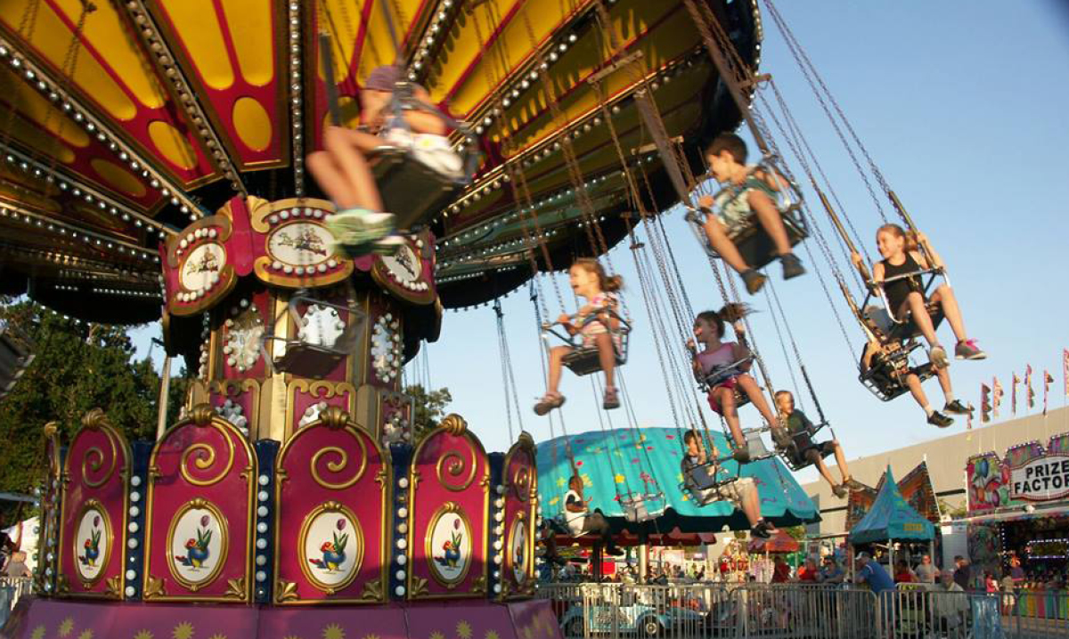 Kids on swing ride at the Michigan State Dair