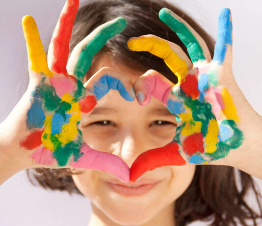 Painted hands sign heart stock photo