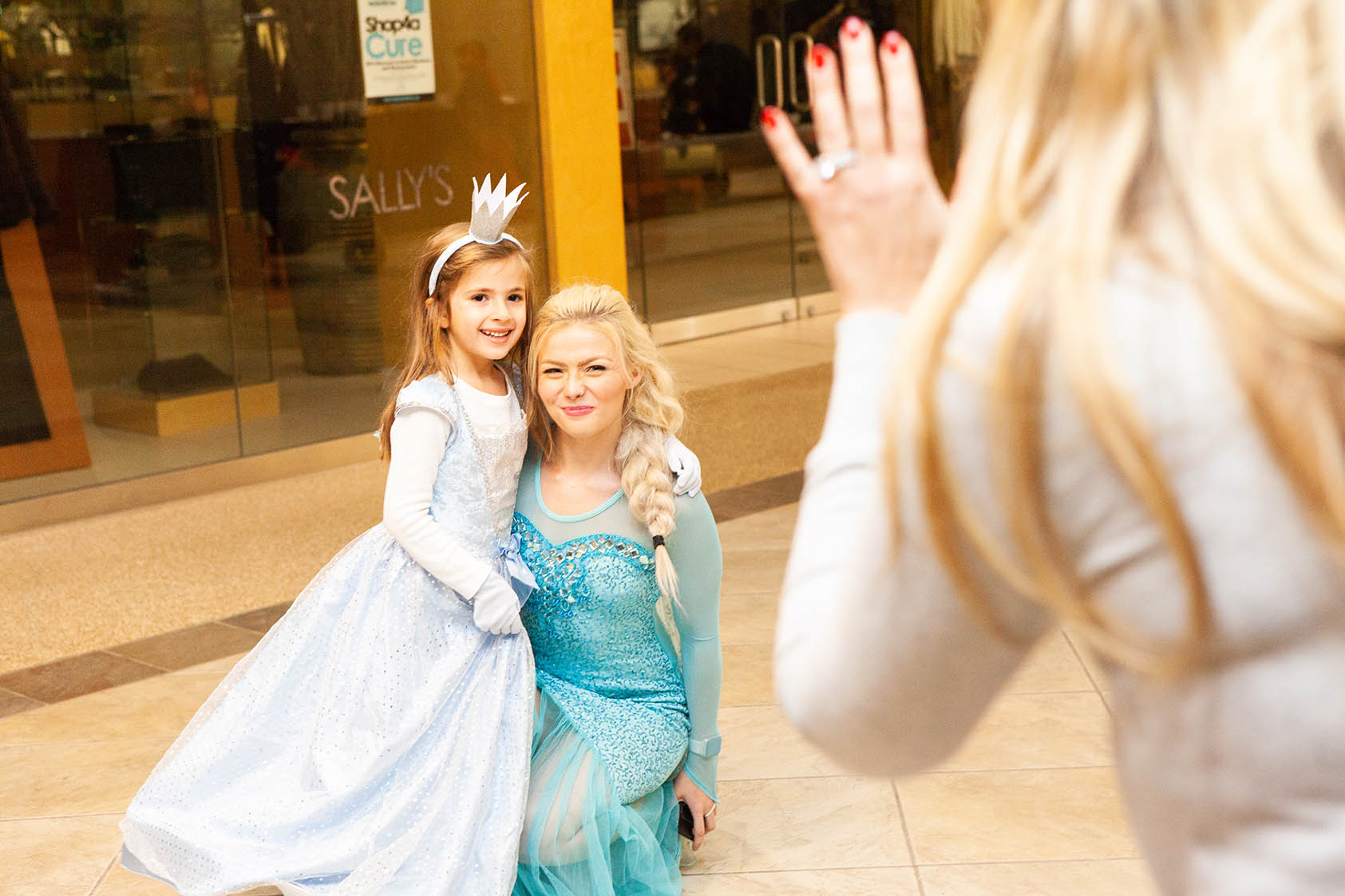 Monster Mash attendee takes picture with Metro Parent's "Elsa" at Orchard Mall on Oct. 26, 2018.