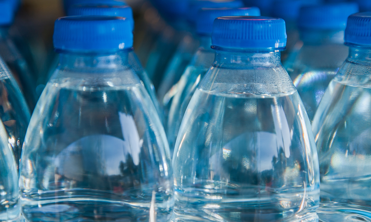 Rows of water in plastic bottles
