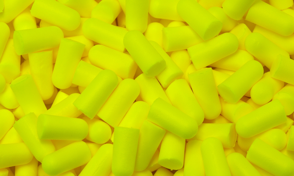 A pile of yellow earplugs