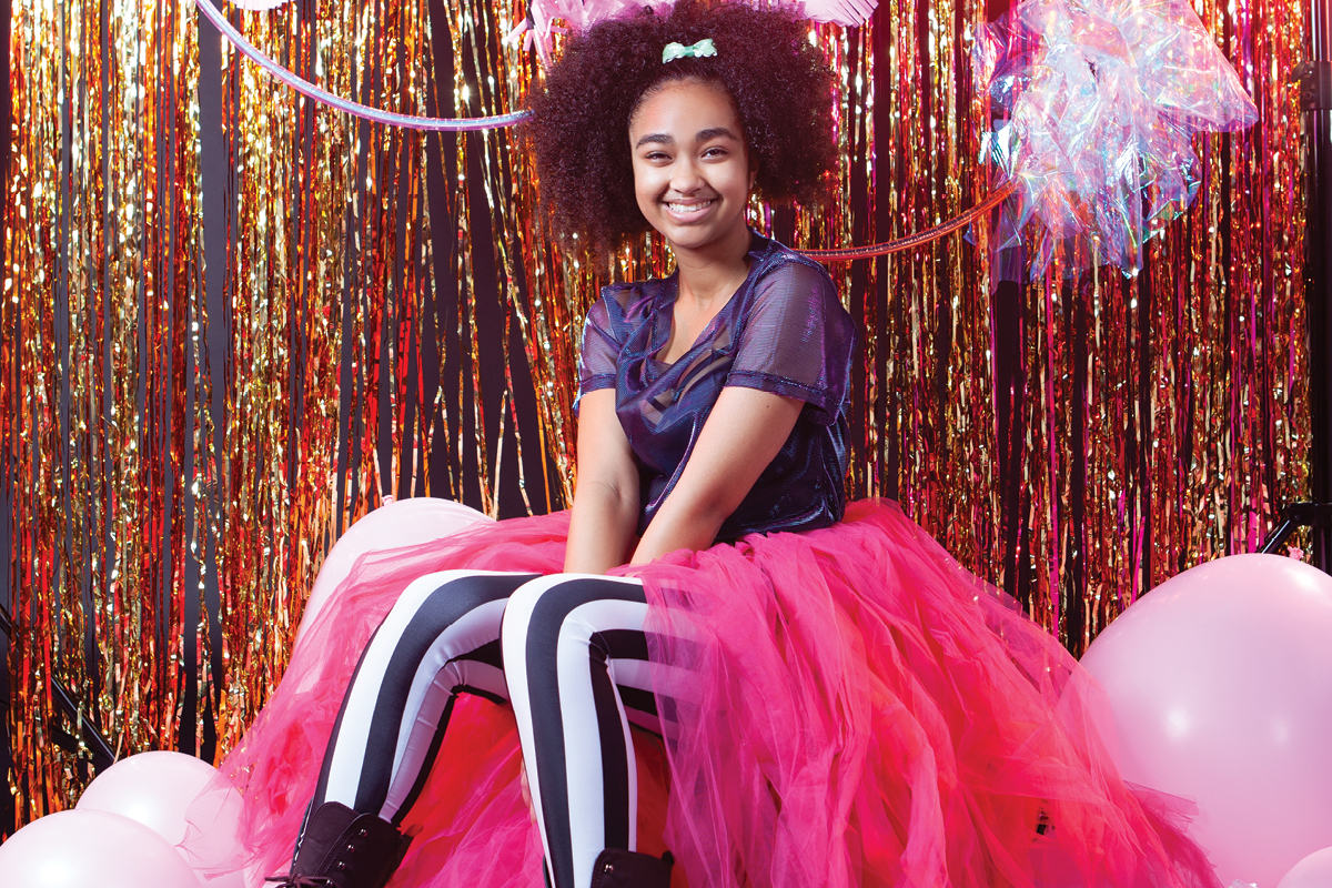 Metro Parent CoverKid posing for a dance picture