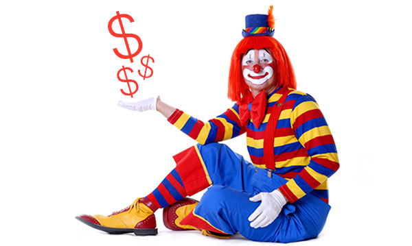 Clown holding red money signs on a white background