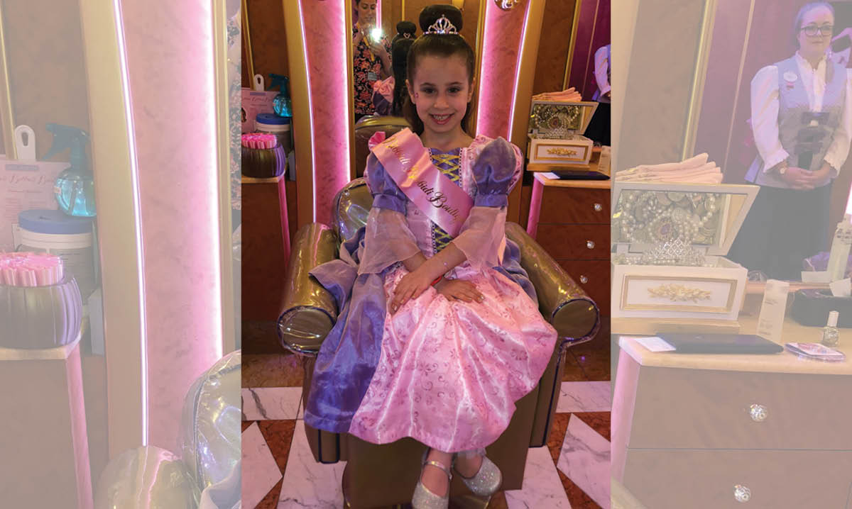 Kid dressed as a princess at a Disney Park