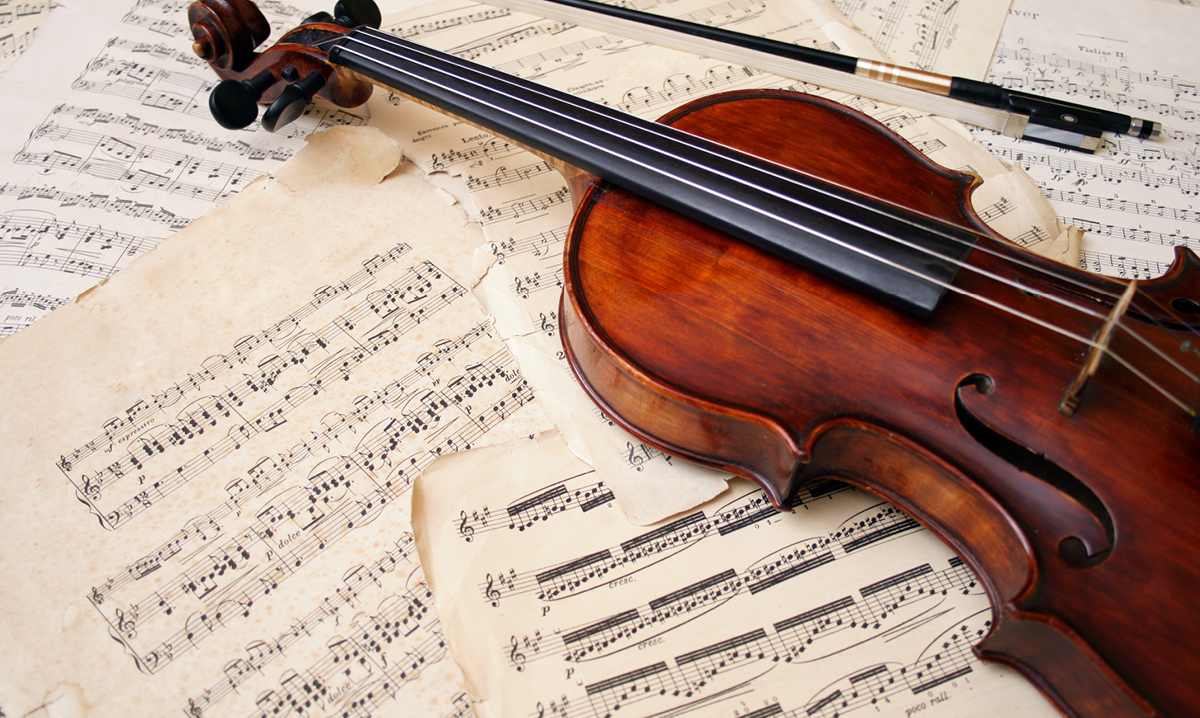 Classical Music Bridges the Grandparent Gap for Metro Detroit Mom Violin on top of music sheets