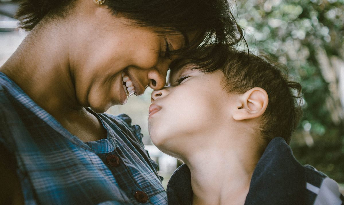 Mom laughing with her son