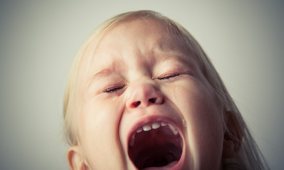 Half a child's face screaming