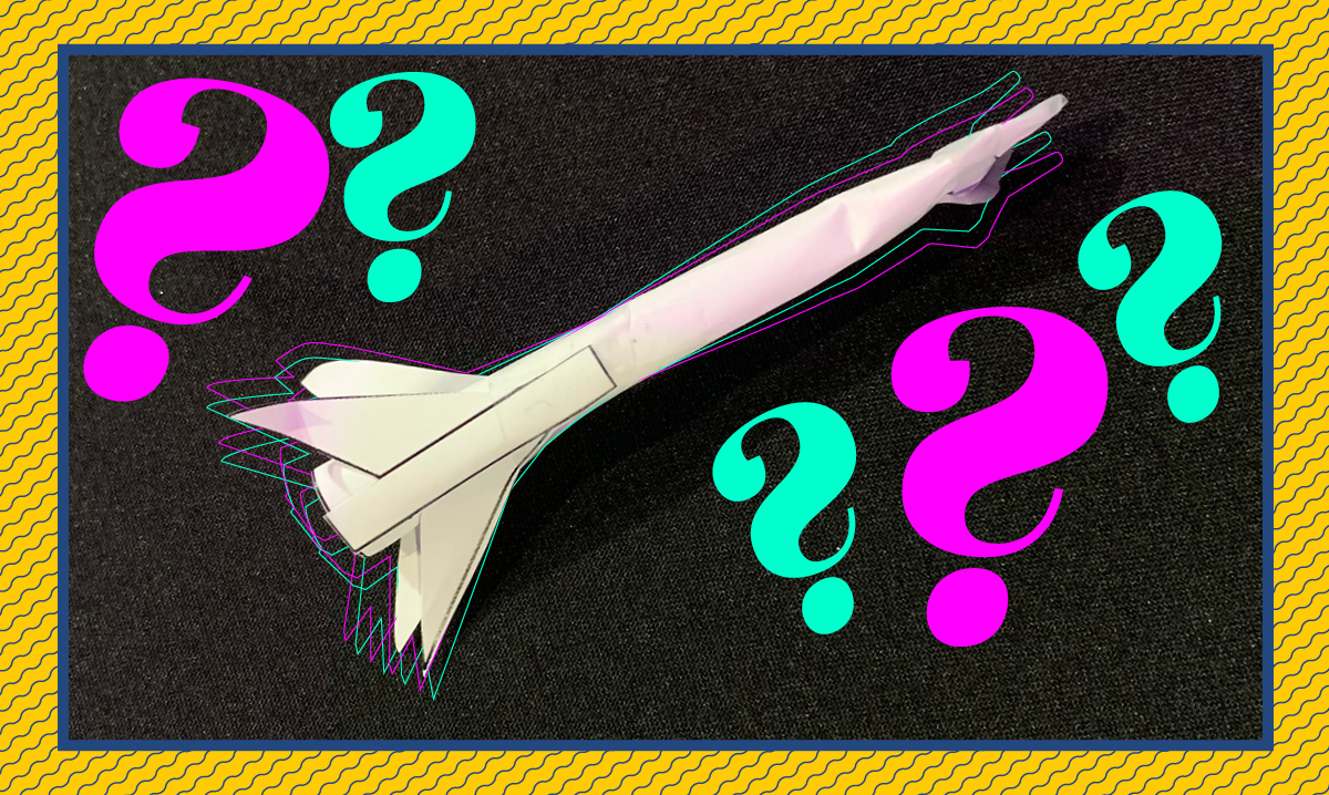 Straw rocket on a black background with a yellow border, featuring teal and pink question marks