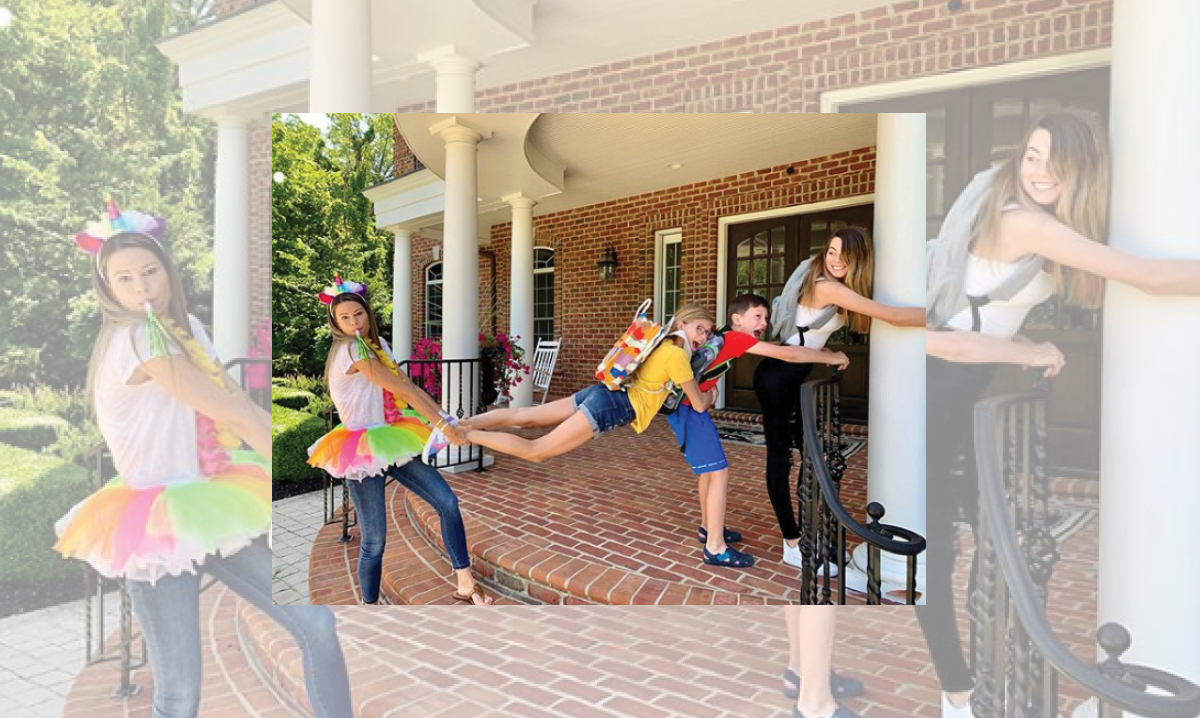 Leslie Anne Brooks in a tutu pulling her kids out the door