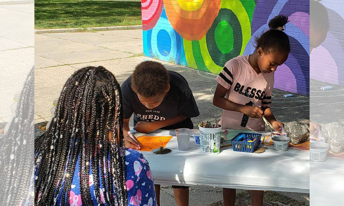 Three kids at the funky ferndale art fair