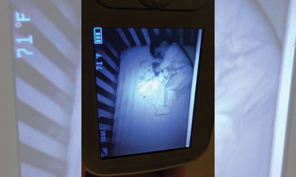 Face of ghost baby next to living baby in crib