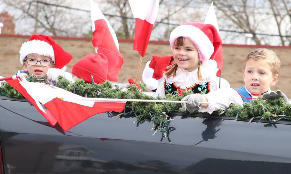 Kids waving in a float