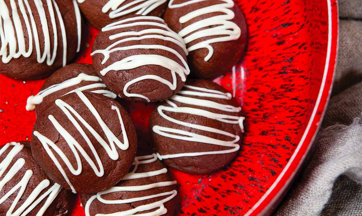 Cherry Cordial cookies on a red plate