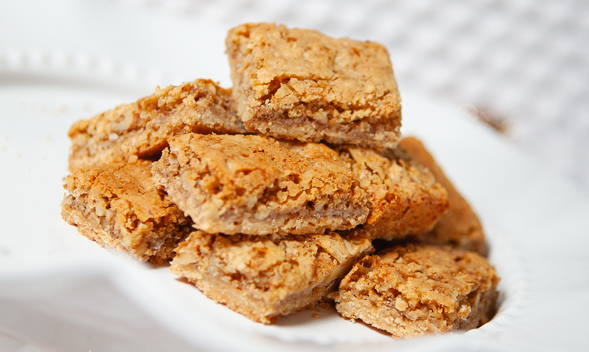 Holiday dream bar cookies on a white background