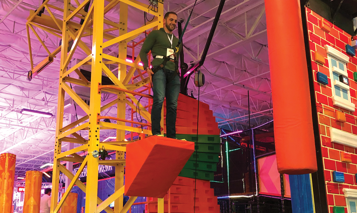 person on obstacle at urban air adventure park in sterling heights