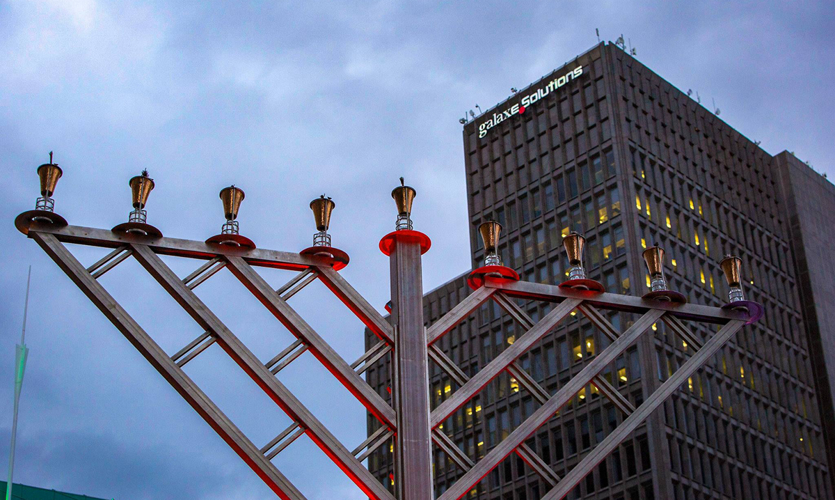 Giant menorah in front of a building in detroit