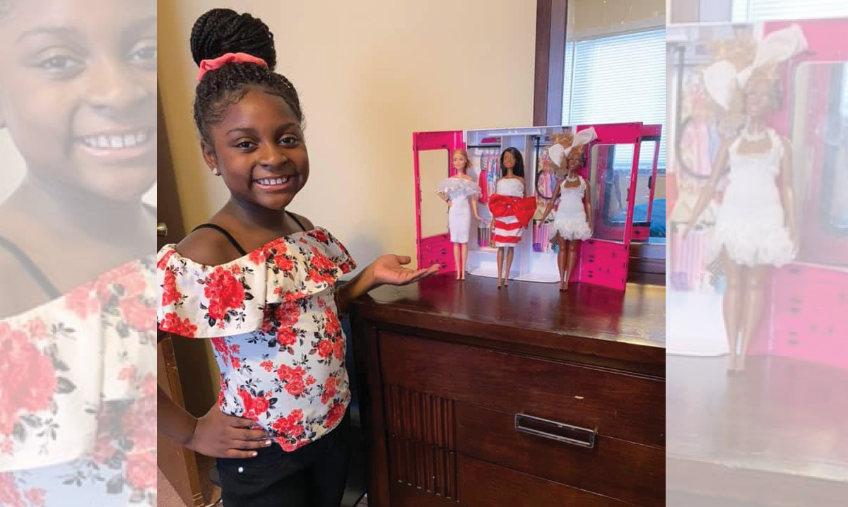 Neveah Woods-Jones showing her designs