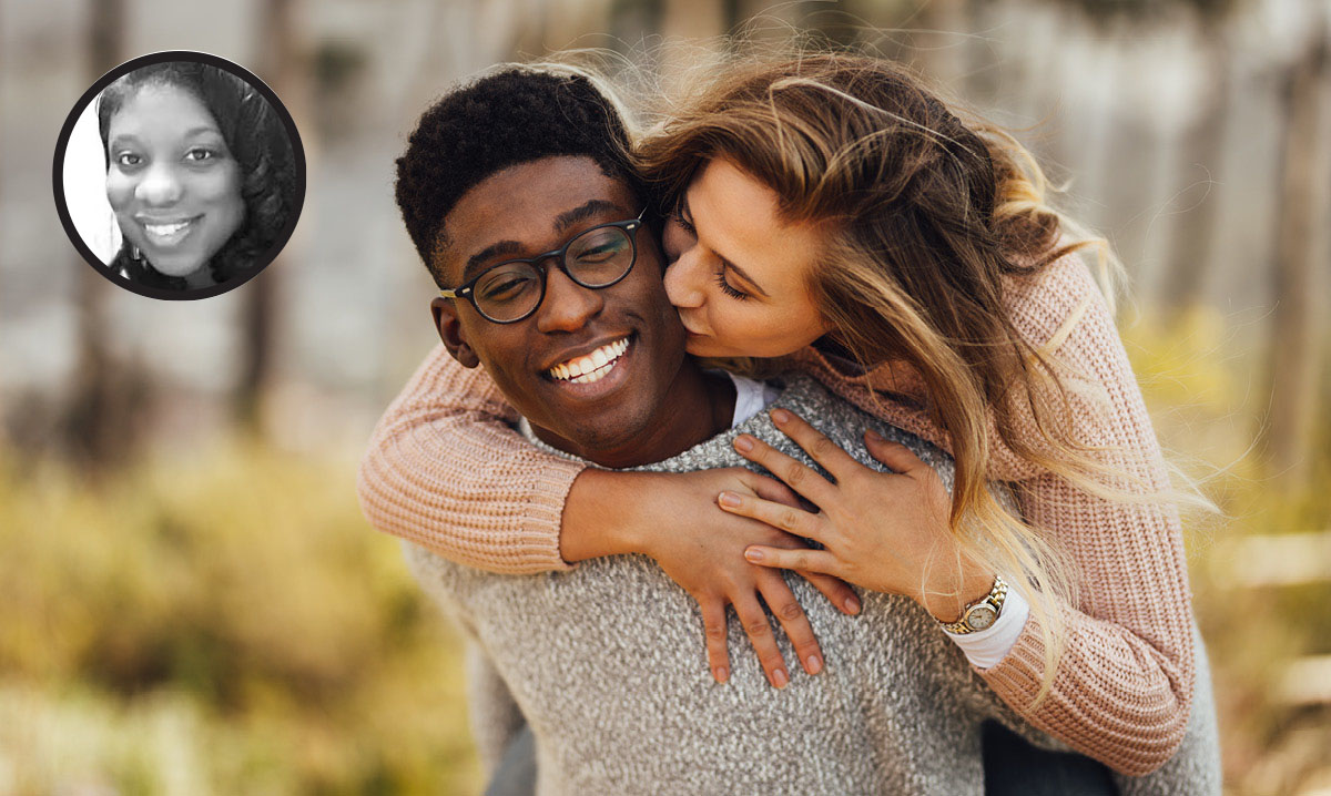 Woman kissing man on the cheek from behind. Author's photo in the corner