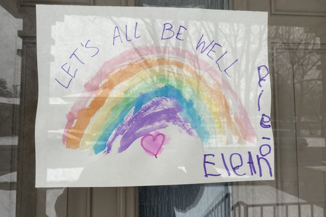 A rainbow hung in a window