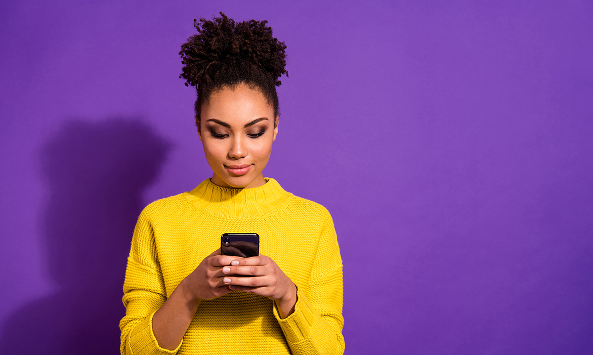 Woman checking enewsletter on mobile phone