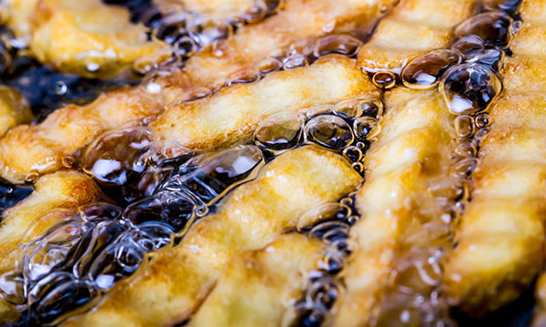 French fries in boiling oil
