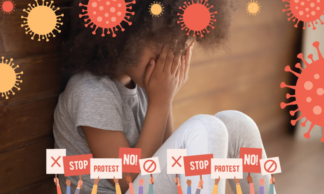 Crying girl surrounded by illustrations of germs and protest signs