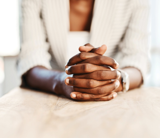 Woman folding her hands