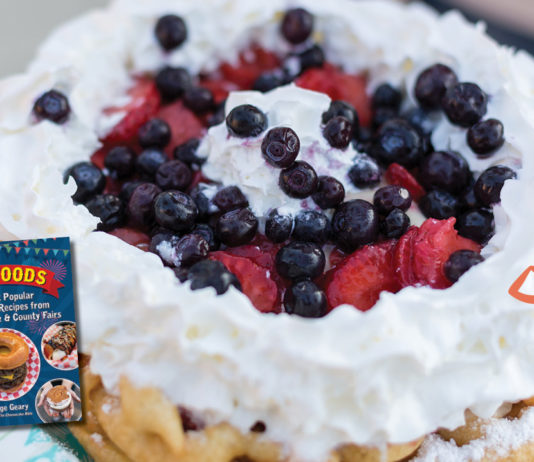 Close-up of a funnel cake with berries