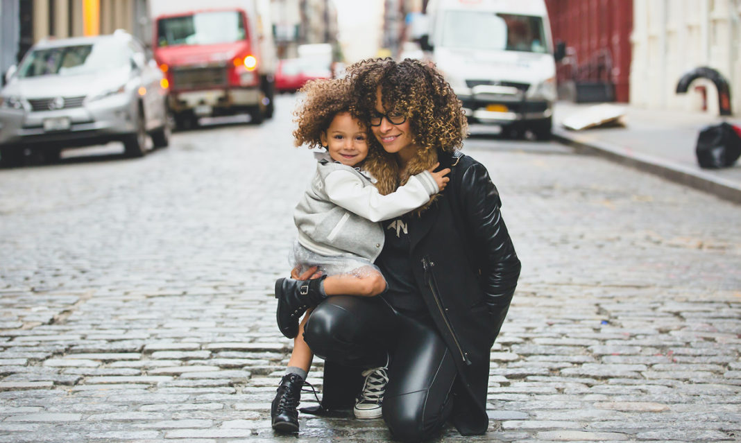 A Black mom and her child