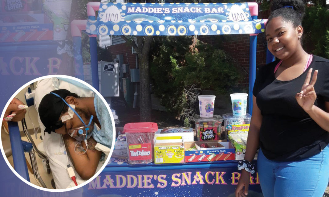 Maddie at her snack bar. A picture of Shane in the corner in a circle