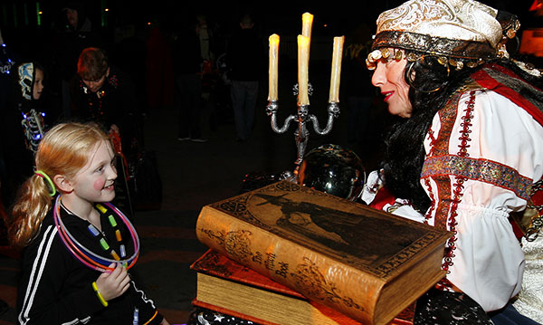 Little girl getting her fortune read