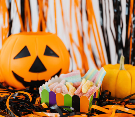 Halloween decorations and candy on a table