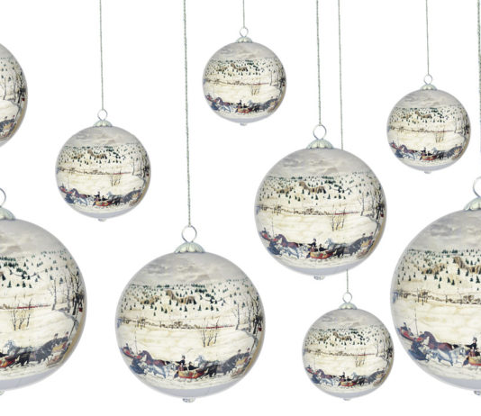10 of the DIA's collectible ornaments hanging on a white background