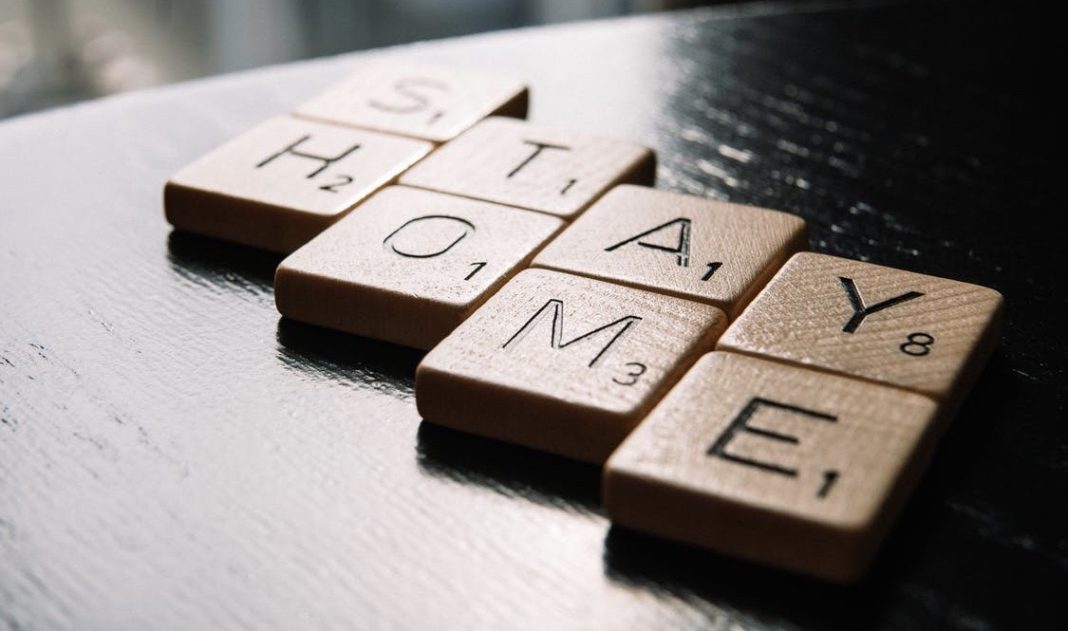 Scrabble Pieces that spell out Stay Home