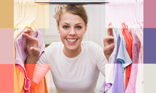 A woman peeking into a tidy closet