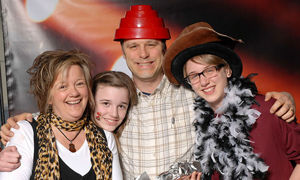 Four people having fun at the Bestest Concert Ever at the Royal Oak Farmers Market