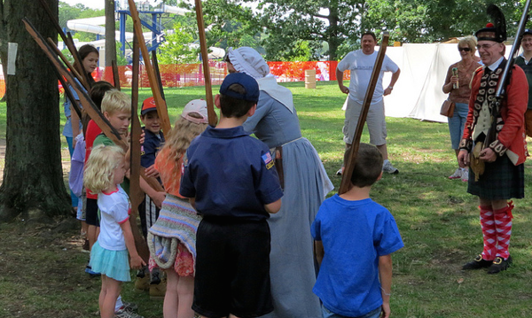 Kids with a reenactor at the colonial Kensington