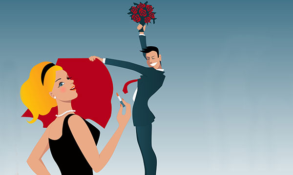 A woman smiles at a man waving a cape with flowers