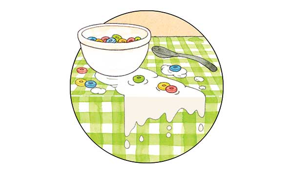 Spilled cereal on a green checkered tablecloth