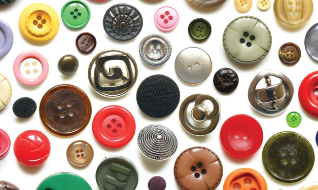 A variety of buttons on a white background