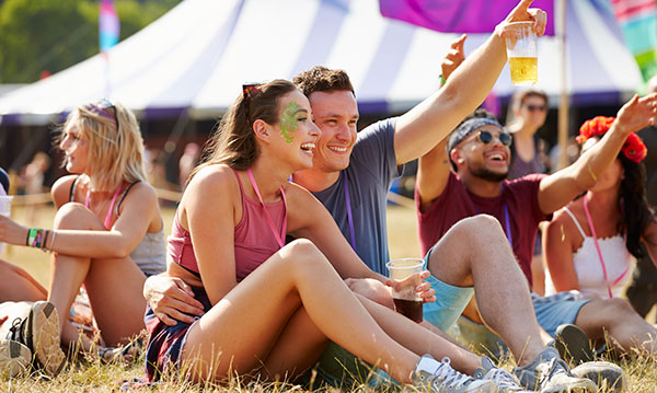 A man and woman at an outdoor show