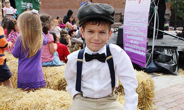 Boy in a victorian costume at the northville heritage festival