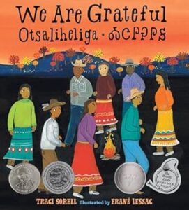 Cover of We Are Grateful: Otsaliheliga by Traci Sorell, illustrated by Frané Lessac. This award-winning children's book celebrates Cherokee culture and the meaning of gratitude through the seasons.