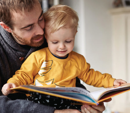 A diverse group of middle school students reading recommended books
